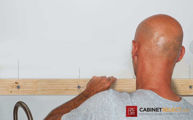 Installing a ledger board for upper cabinet installation | CabinetSelect.com
